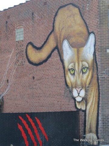 Big Cat on side of building in The Grove