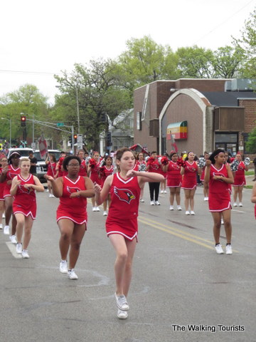 Cheerleaders march down the street at the Cinco de Mayo parade