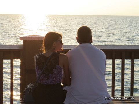 Couple watching the sunset at Pier 60 in Clearwater Beach