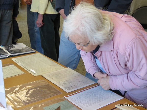 A woman checks out some of the artifacts on display during the history presentation.