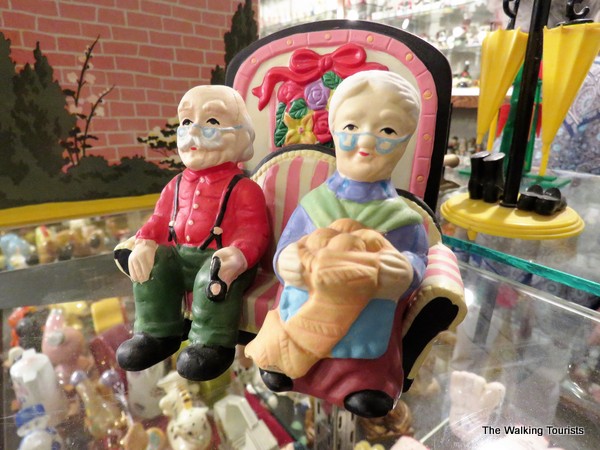 Santa and Mrs. Claus sitting on a love seat shaker set