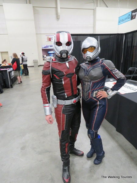 People dressed in costume as Ant-Man and The Wasp.
