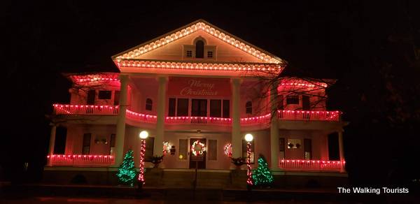 Seelye Mansion lit up at night.