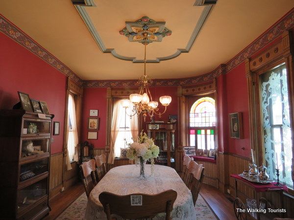 The dining room features artistic molding on the ceiling among the attractive features.